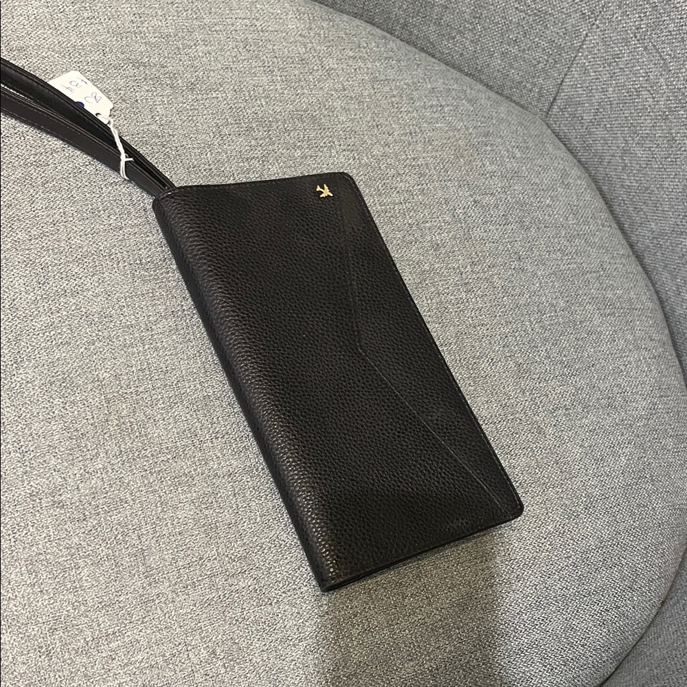 Black Textured Love & Lore passport holder with Strap